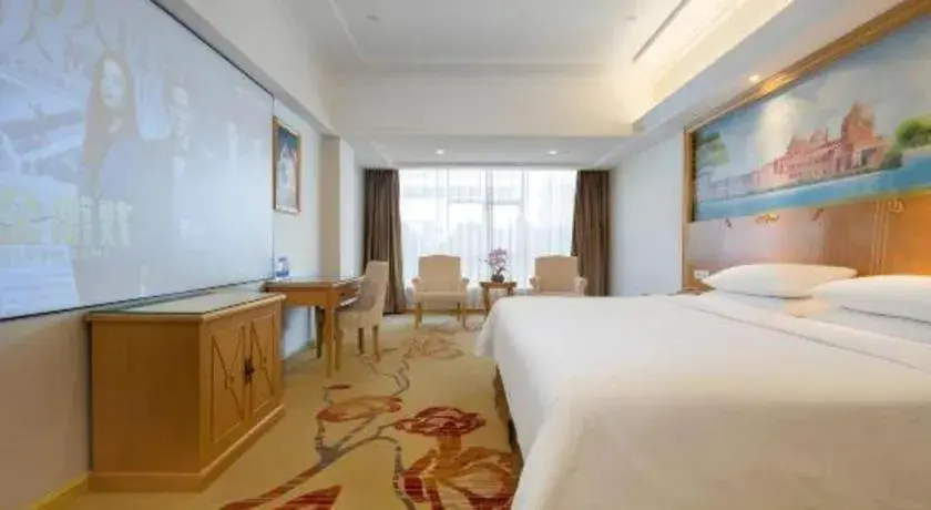 Bed in Vienna Hotel Shenzhen Longgang Baifucheng Bed in Vienna Hotel Shenzhen Longgang Baifucheng