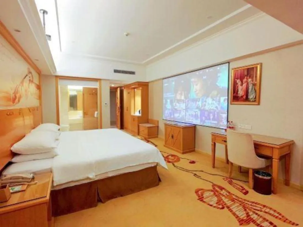 Bed in Vienna Hotel Shenzhen Longgang Baifucheng