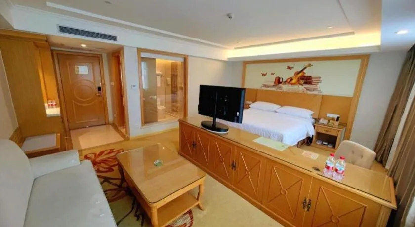 Bed in Vienna Hotel Shenzhen Longgang Baifucheng