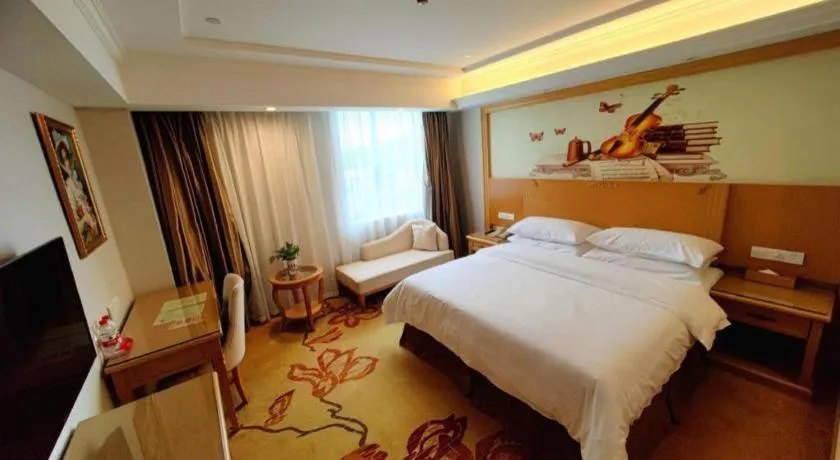 Bed in Vienna Hotel Shenzhen Longgang Baifucheng