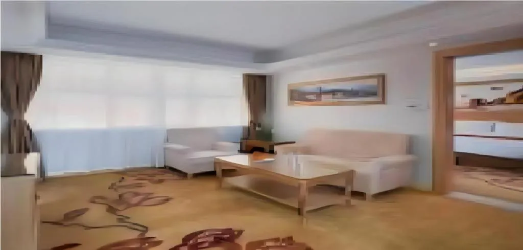 Bed in Vienna Hotel Shenzhen Longgang Baifucheng