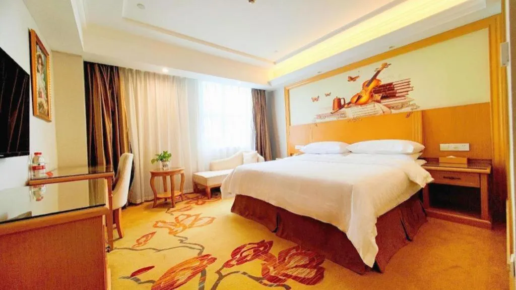 Bed in Vienna Hotel Shenzhen Longgang Baifucheng