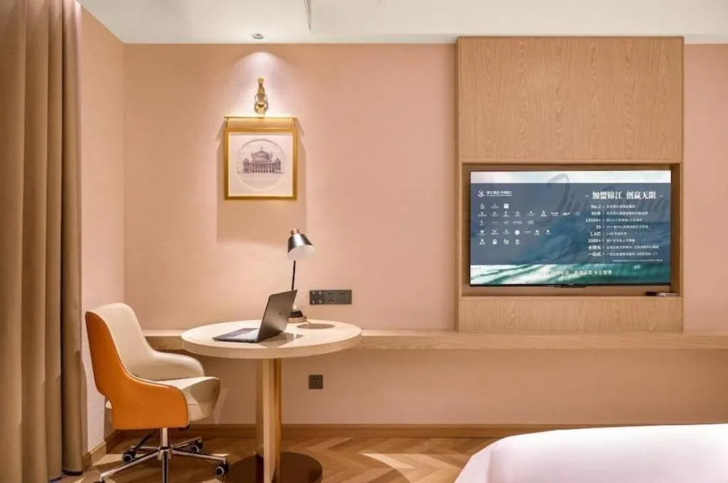 Bed in Vienna Hotel Shenzhen Longgang Baifucheng