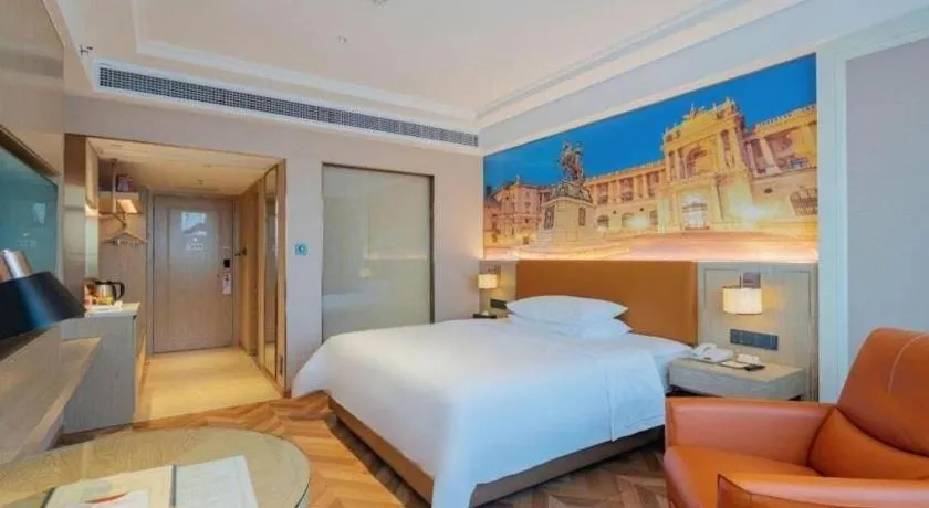 Bed in Vienna Hotel Shenzhen Longgang Baifucheng