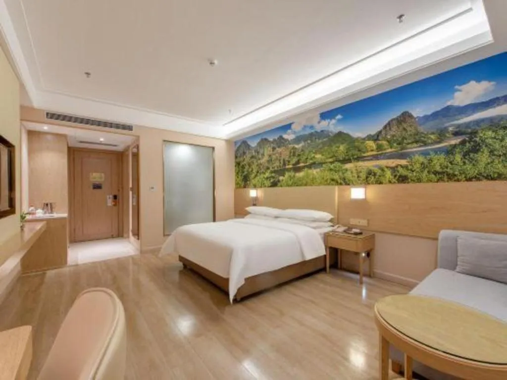 Bed in Vienna Hotel Shenzhen Longgang Baifucheng