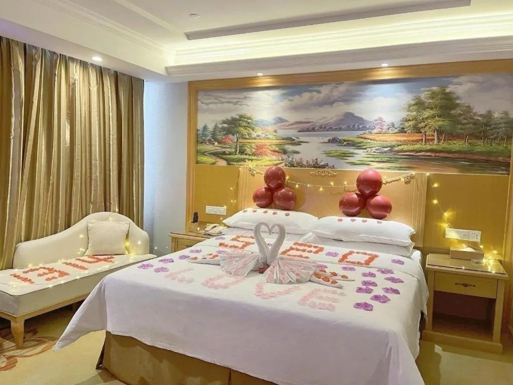 Bed in Vienna Hotel Shenzhen Longgang Baifucheng