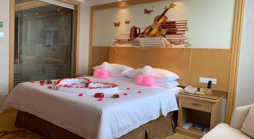 Bed in Vienna Hotel Shenzhen Longgang Baifucheng