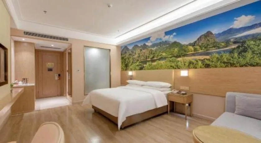 Bed in Vienna Hotel Shenzhen Longgang Baifucheng
