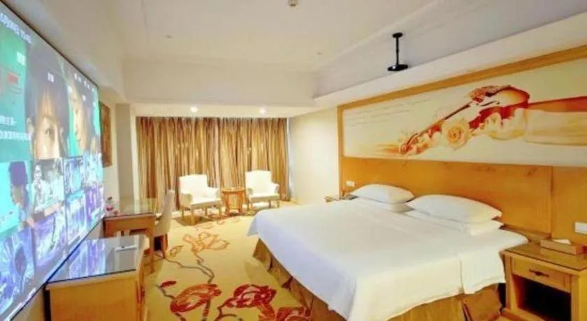 Bed in Vienna Hotel Shenzhen Longgang Baifucheng