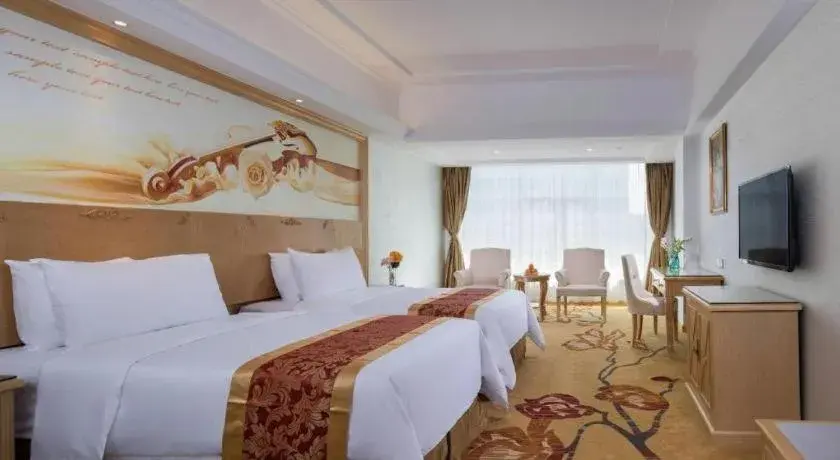 Bed in Vienna Hotel Shenzhen Longgang Baifucheng Bed in Vienna Hotel Shenzhen Longgang Baifucheng