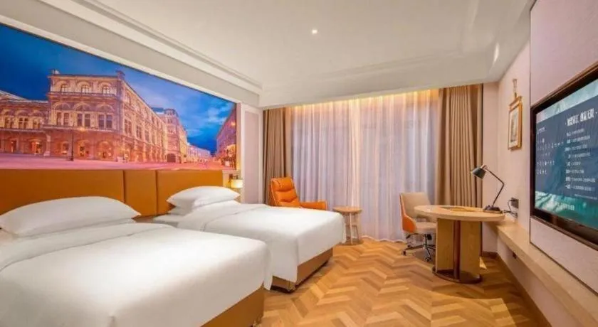 Bed in Vienna Hotel Shenzhen Longgang Baifucheng