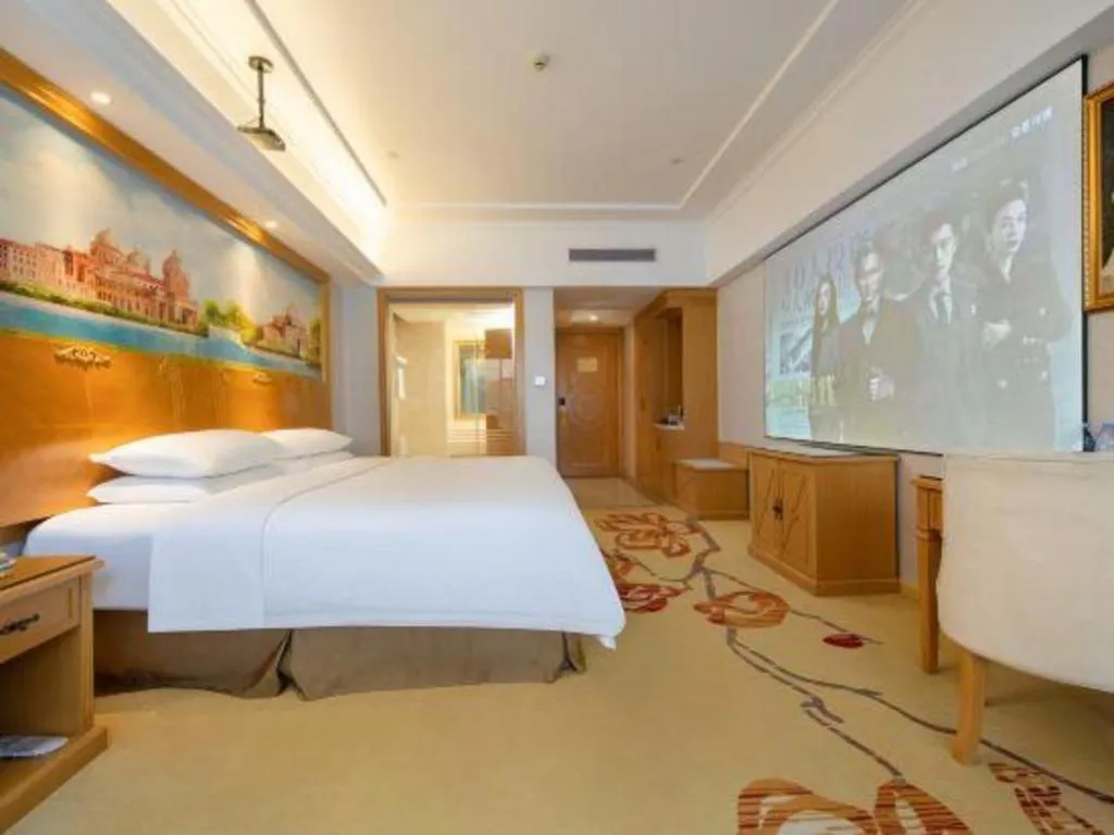 Bed in Vienna Hotel Shenzhen Longgang Baifucheng