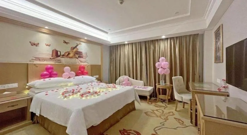 Bed in Vienna Hotel Shenzhen Longgang Baifucheng