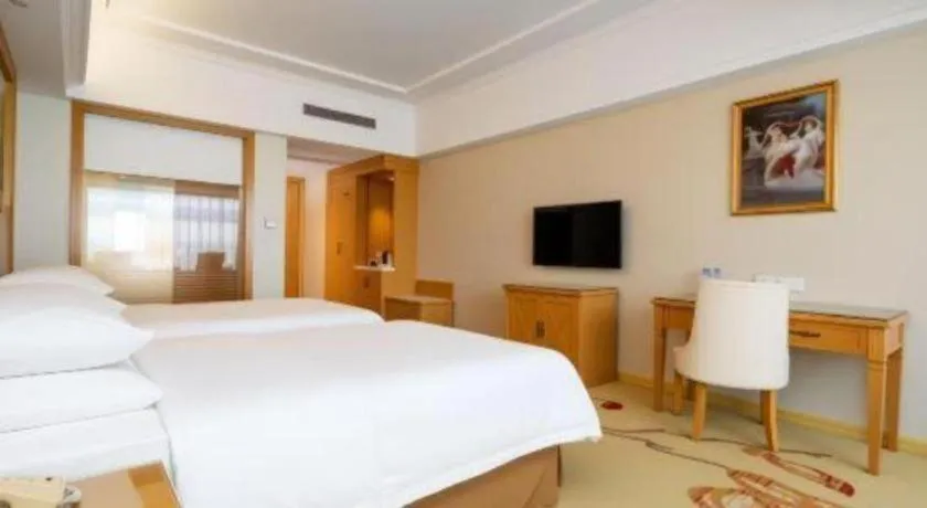 Bed in Vienna Hotel Shenzhen Longgang Baifucheng