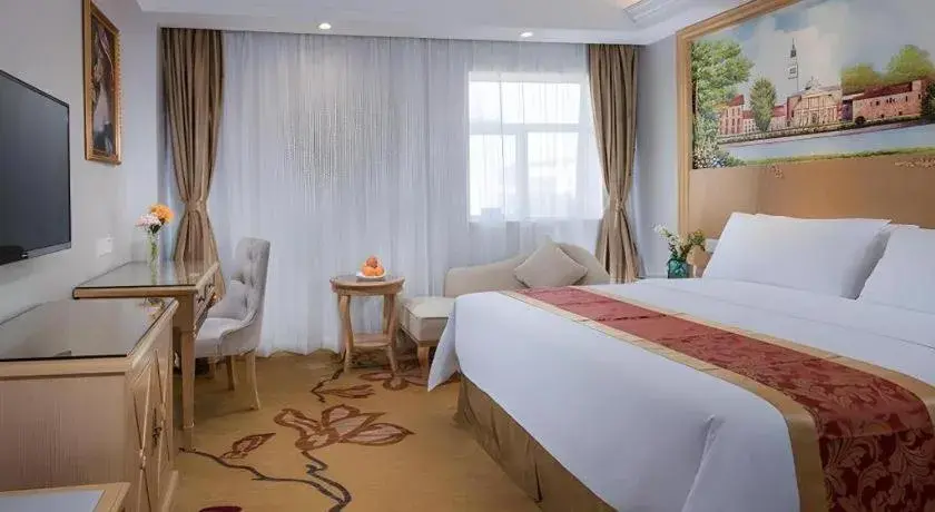 Bed in Vienna Hotel Shenzhen Longgang Baifucheng Bed in Vienna Hotel Shenzhen Longgang Baifucheng