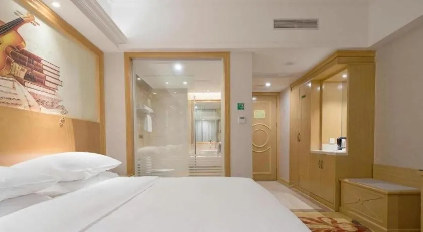 Bed in Vienna Hotel Shenzhen Longgang Baifucheng