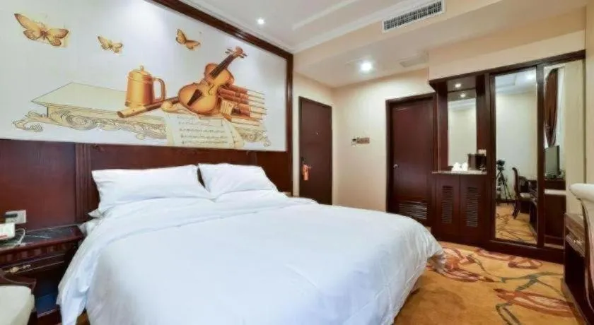 Bed in Vienna Classic Hotel Zhangzhou Longchi Center