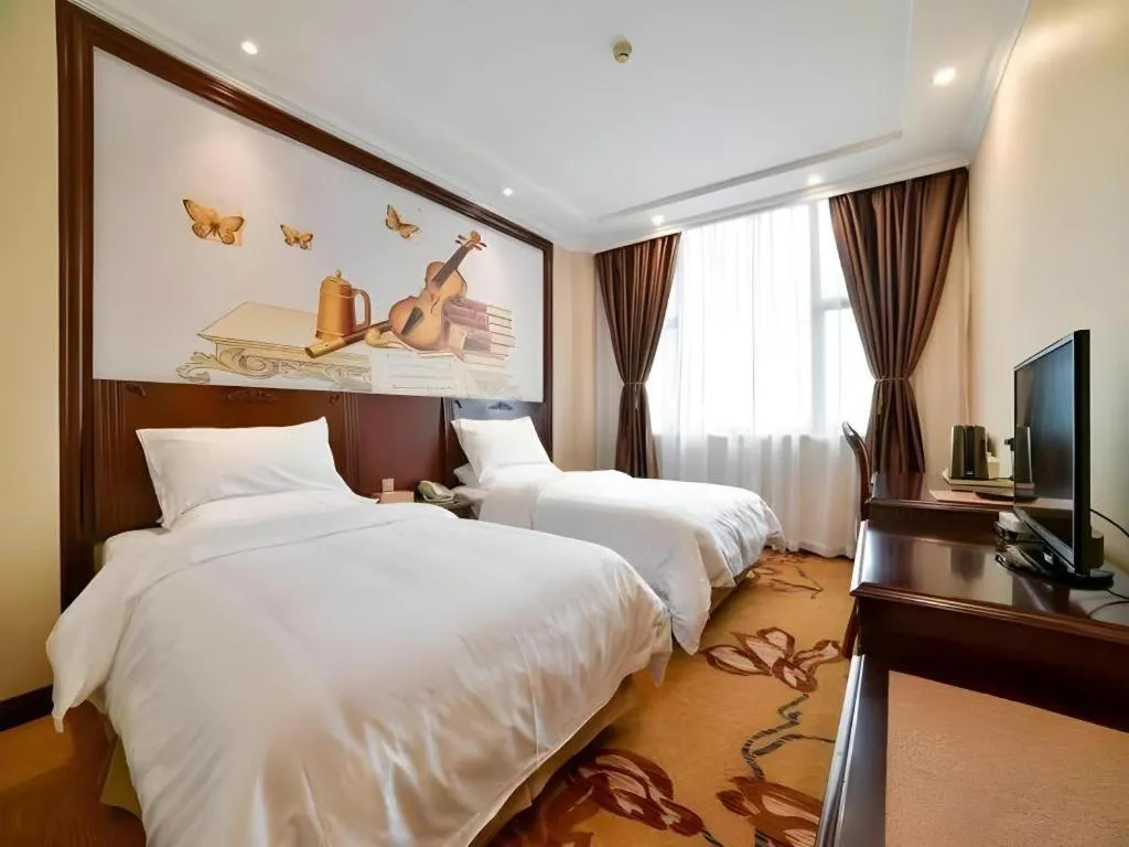 Bed in Vienna Classic Hotel Zhangzhou Longchi Center