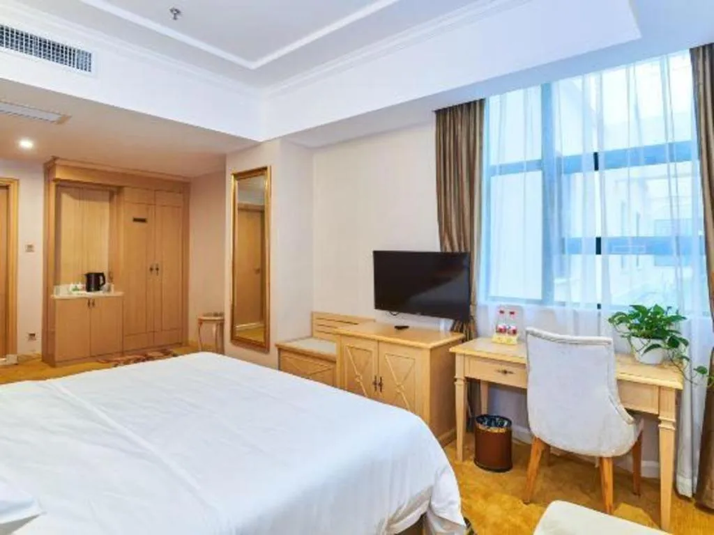 Bed in Vienna Classic Hotel Zhangzhou Longchi Center