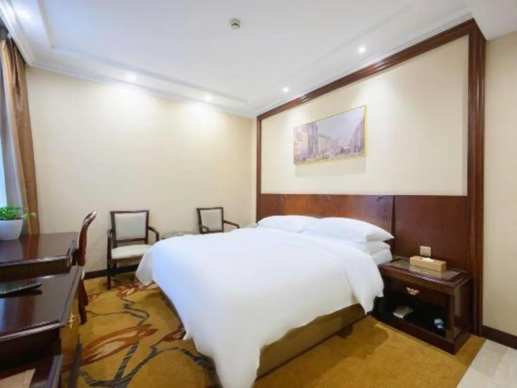 Bed in Vienna Classic Hotel Zhangzhou Longchi Center