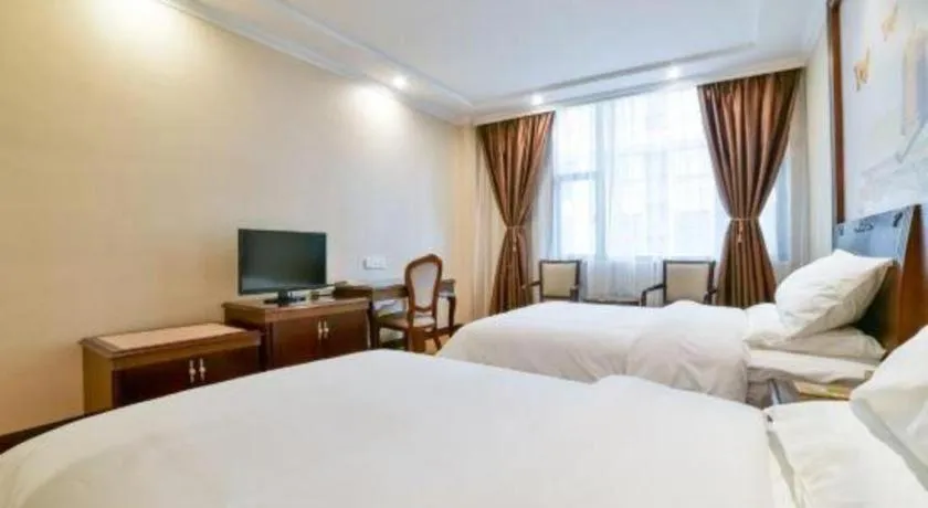 Bed in Vienna Classic Hotel Zhangzhou Longchi Center