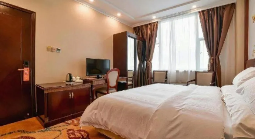 Bed in Vienna Classic Hotel Zhangzhou Longchi Center