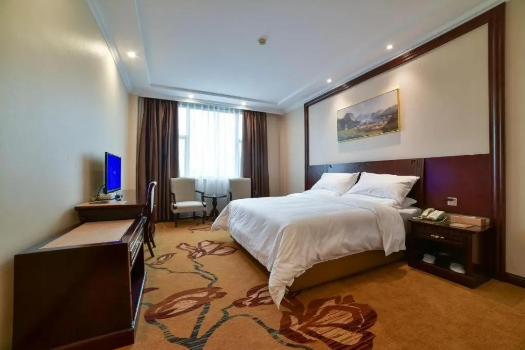 Bed in Vienna Classic Hotel Zhangzhou Longchi Center