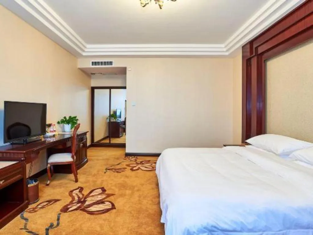 Bed in Vienna Classic Hotel Zhangzhou Longchi Center