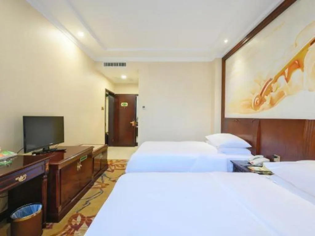 Bed in Vienna Classic Hotel Zhangzhou Longchi Center