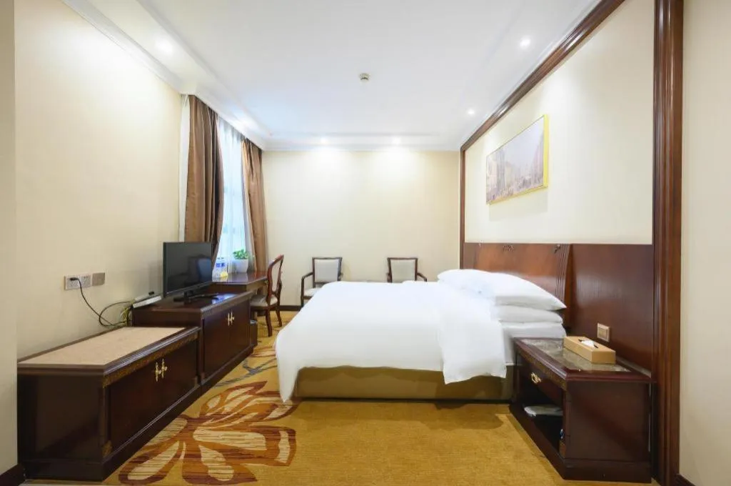 Bed in Vienna Classic Hotel Zhangzhou Longchi Center