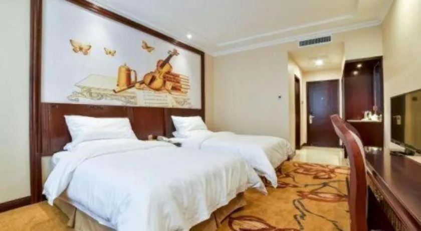 Bed in Vienna Classic Hotel Zhangzhou Longchi Center