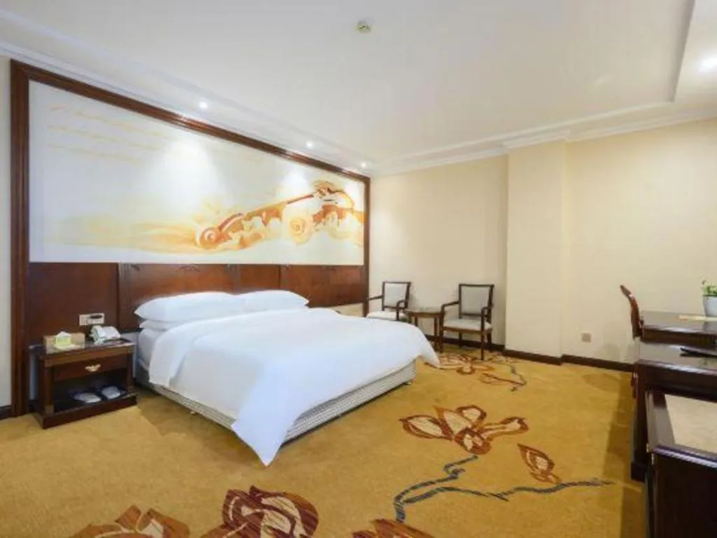 Bed in Vienna Classic Hotel Zhangzhou Longchi Center