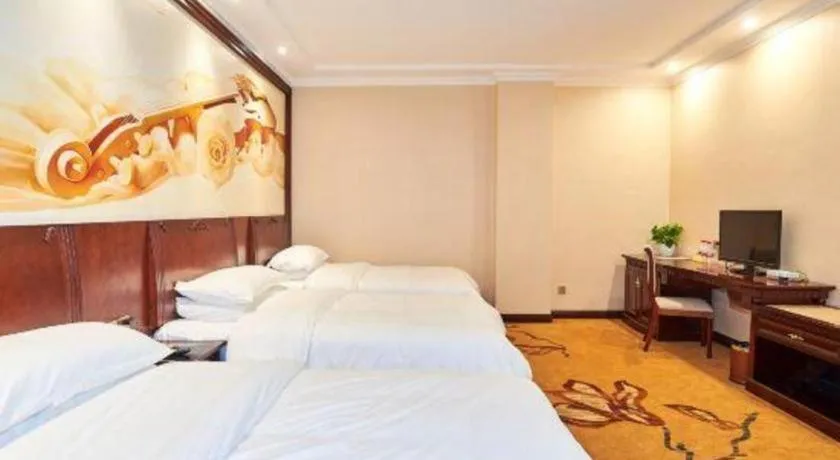 Bed in Vienna Classic Hotel Zhangzhou Longchi Center