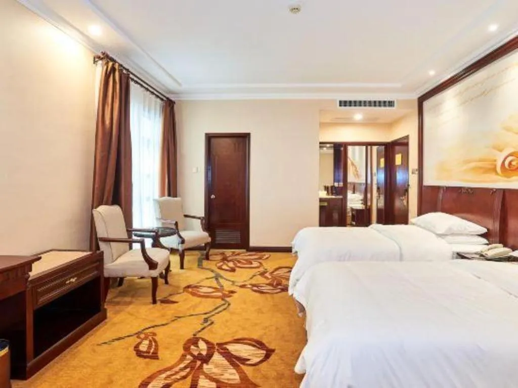 Bed in Vienna Classic Hotel Zhangzhou Longchi Center