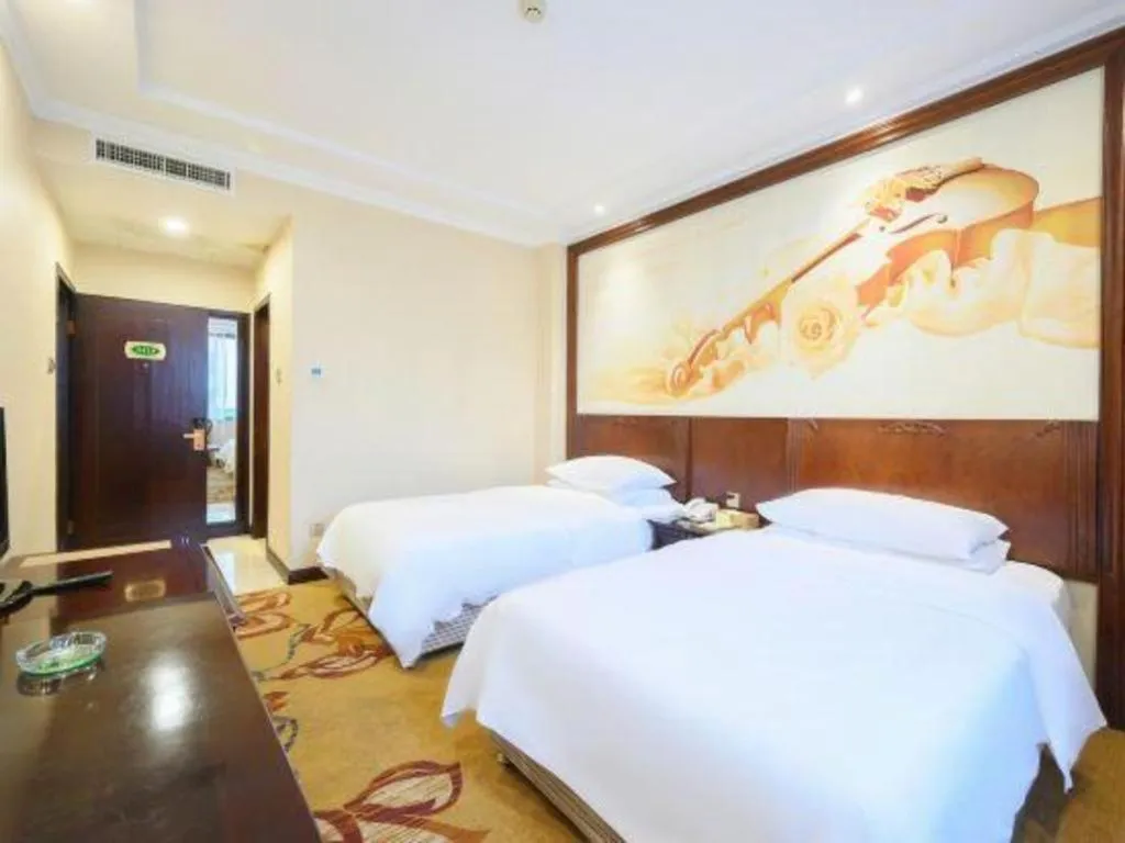 Bed in Vienna Classic Hotel Zhangzhou Longchi Center