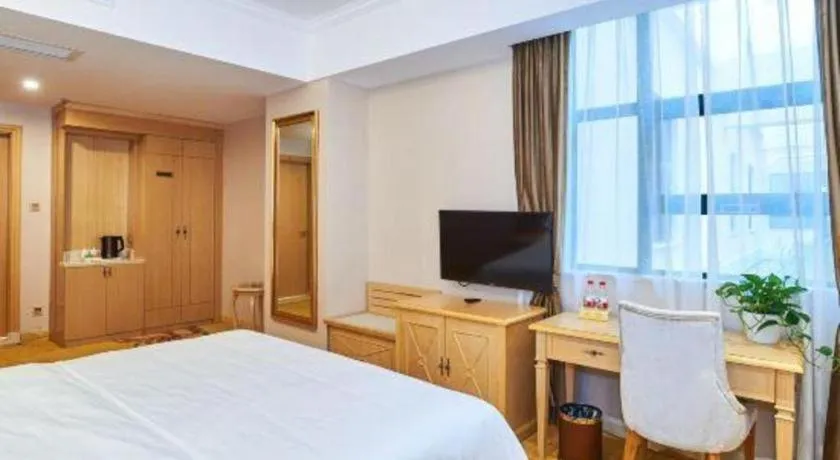 Bed in Vienna Classic Hotel Zhangzhou Longchi Center