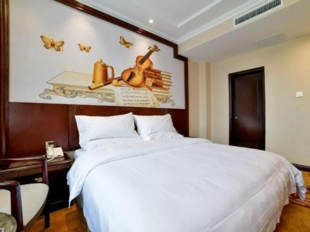 Bed in Vienna Classic Hotel Zhangzhou Longchi Center