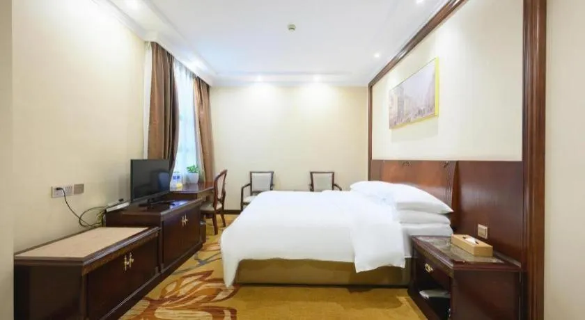 Bed in Vienna Classic Hotel Zhangzhou Longchi Center