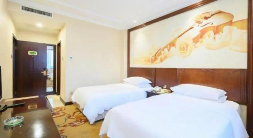 Bed in Vienna Classic Hotel Zhangzhou Longchi Center