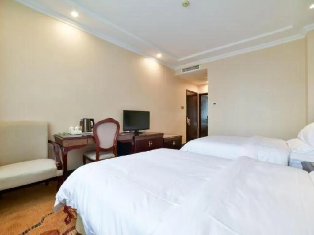 Bed in Vienna Classic Hotel Zhangzhou Longchi Center