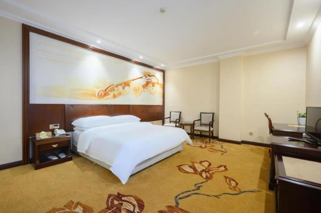 Bed in Vienna Classic Hotel Zhangzhou Longchi Center