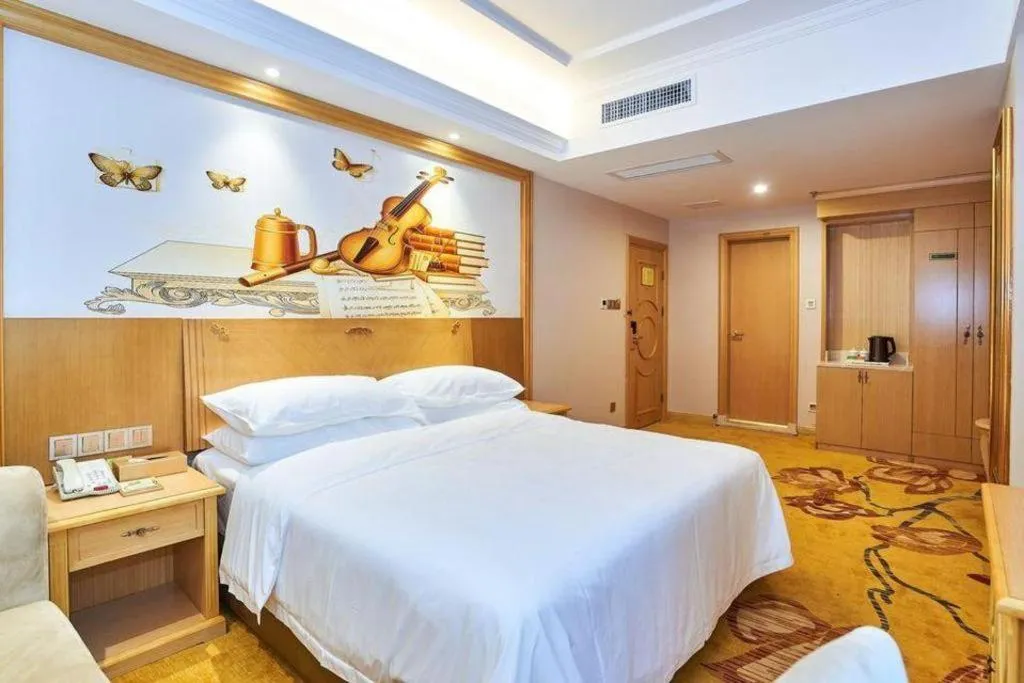 Bed in Vienna Classic Hotel Zhangzhou Longchi Center