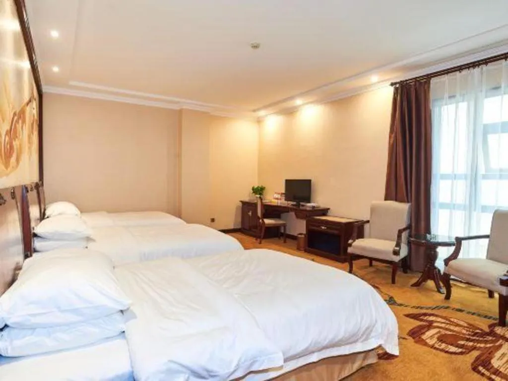 Bed in Vienna Classic Hotel Zhangzhou Longchi Center