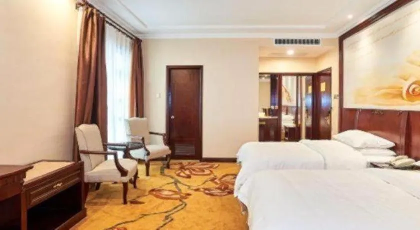 Bed in Vienna Classic Hotel Zhangzhou Longchi Center