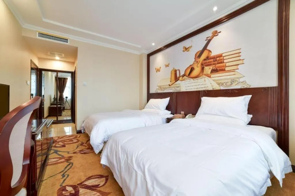 Bed in Vienna Classic Hotel Zhangzhou Longchi Center