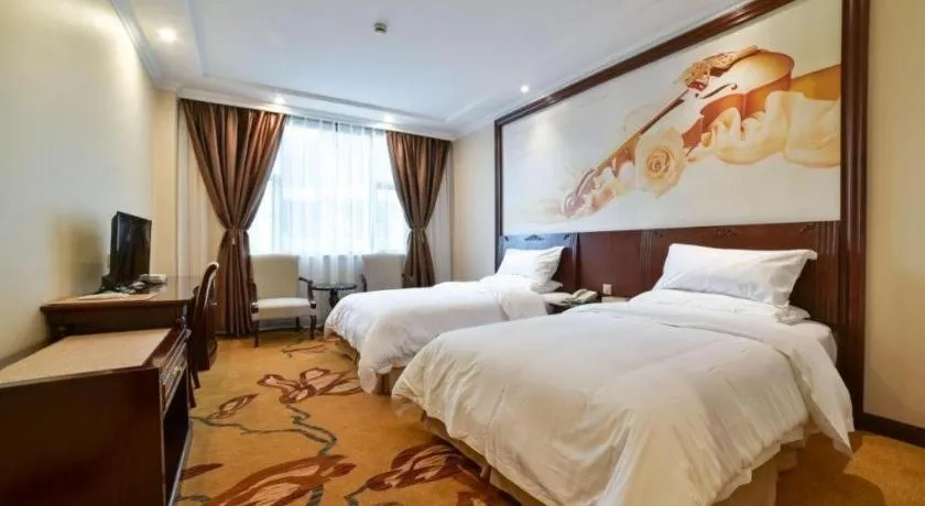 Bed in Vienna Classic Hotel Zhangzhou Longchi Center