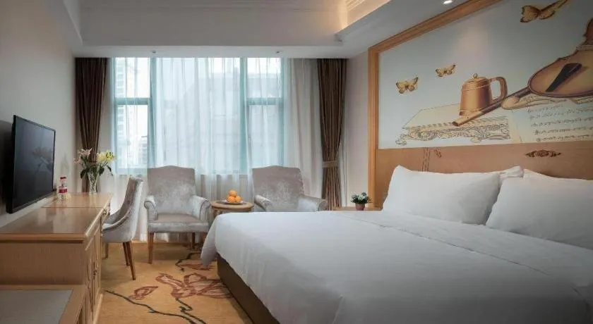 Bed in Vienna Classic Hotel Zhangzhou Longchi Center