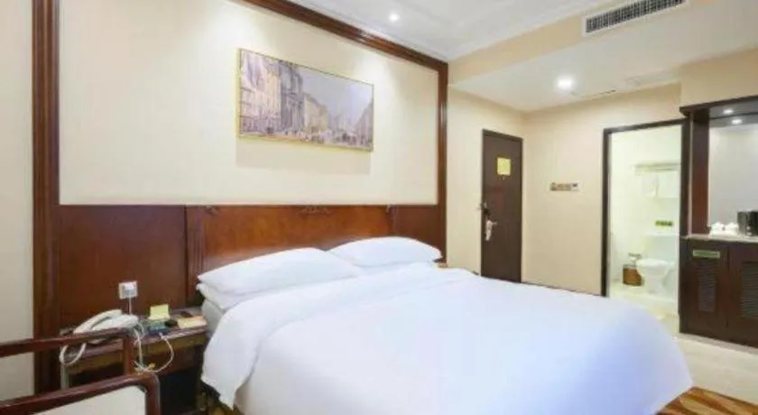 Bed in Vienna Classic Hotel Zhangzhou Longchi Center