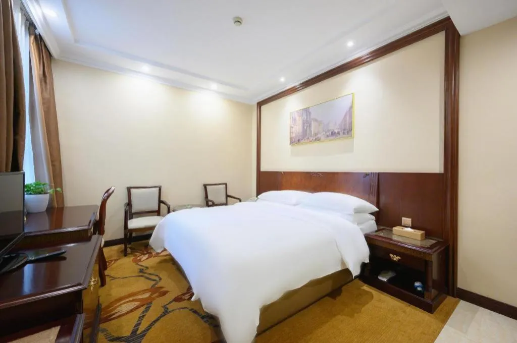 Bed in Vienna Classic Hotel Zhangzhou Longchi Center
