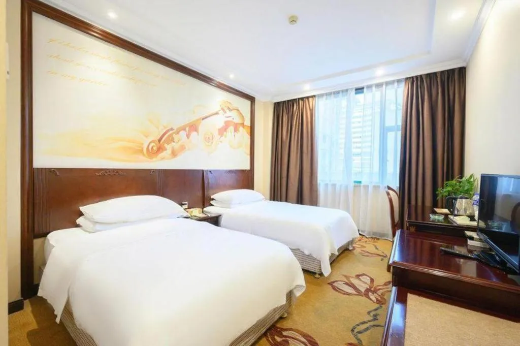 Bed in Vienna Classic Hotel Zhangzhou Longchi Center